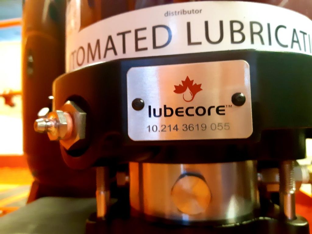 Lubecore Automated Lubrication System Pump Closeup With Serial Number Plate
